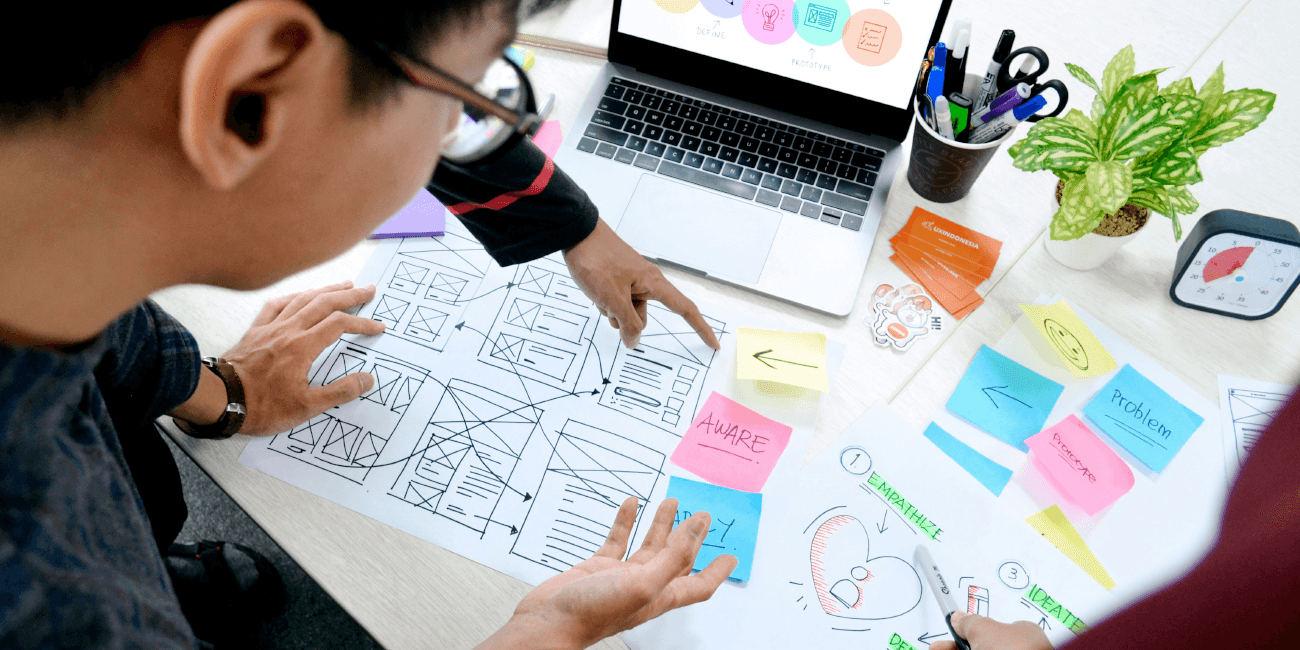 Graphic Design Process at Vhiron Technologies – Collaborative Branding, Logo Creation, and UI/UX Design Workflow